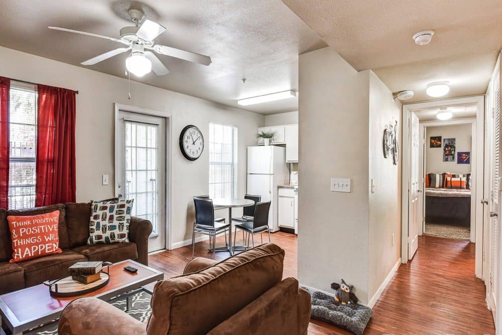 crossing place college station off campus apartments near texas a m fully furnished living room dining area kitchen