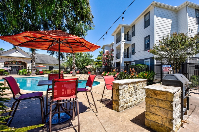 crossing place college station off campus apartments near texas a m poolside grill and seating